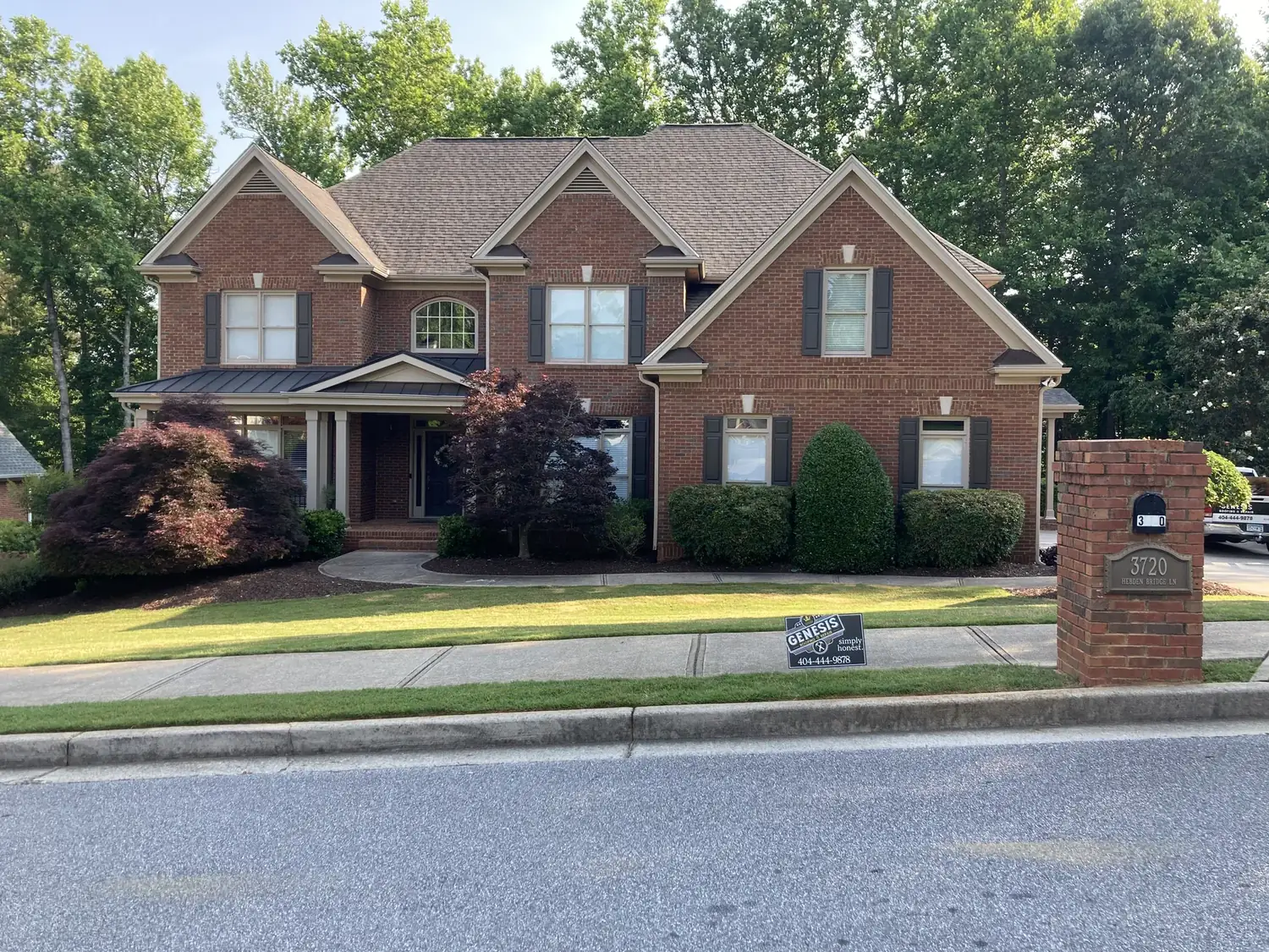 Completed roof on another brick home